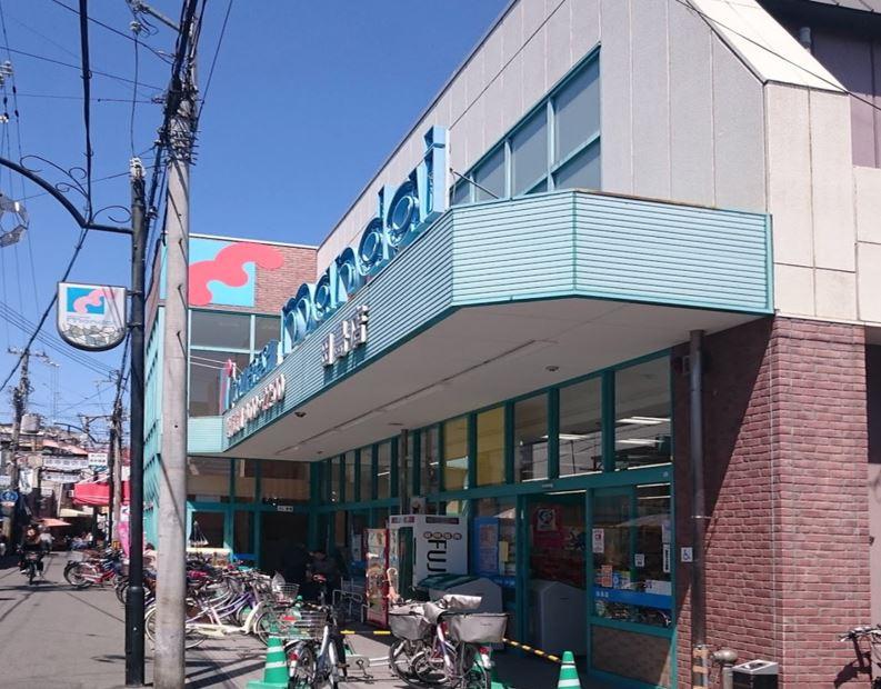 万代田島店
