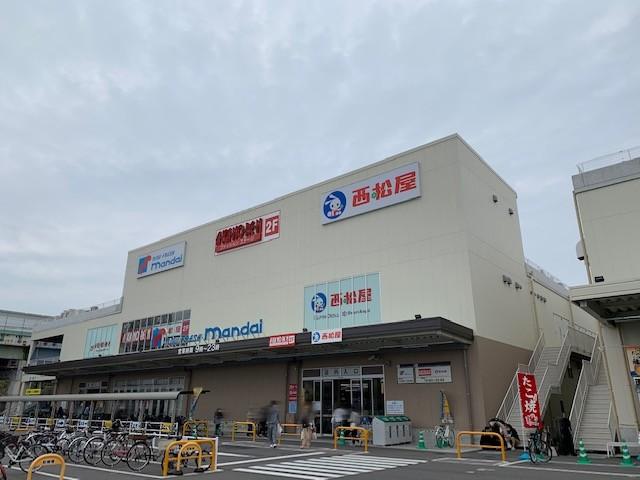 万代堺高須店